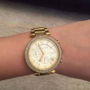 SOLD. Michael Kors stainless steel watch in gold